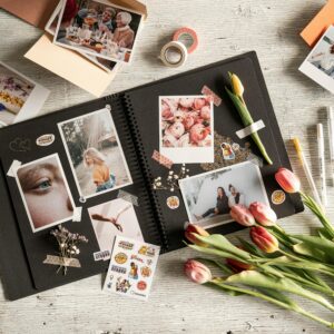 Artistic scrapbook with photos, tulips, and decorative elements, perfect for DIY inspiration.